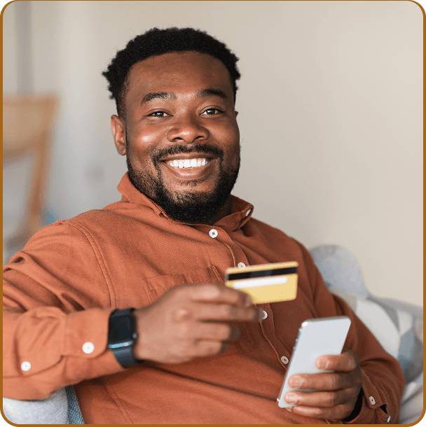 Man holding an ATM Card